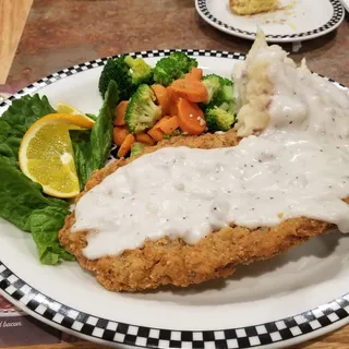 BIGFOOT Chicken Fried Steak & Eggs* (2520-2580 cals.)