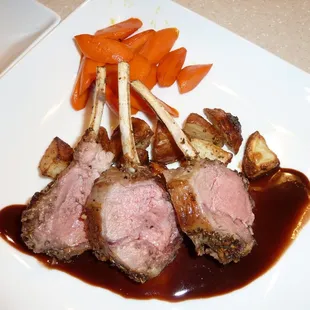 rack of lamb, white truffle oil roasted red potatoes, and glazed carrots