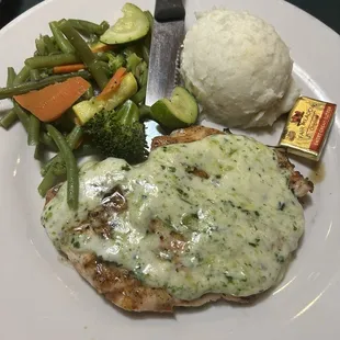 Pestro grilled chicken with mashed potatoes and veggies