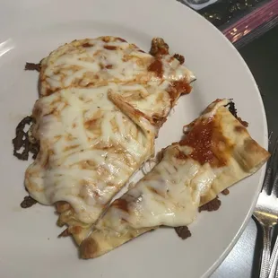 Kids cheese pizza, could be cooked longer, little sloppy and average for $9