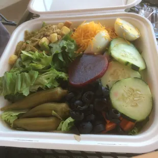 My wife's $3 all you can eat salad or all you can pack takeout with my liver &amp; grilled onion entree purchase.