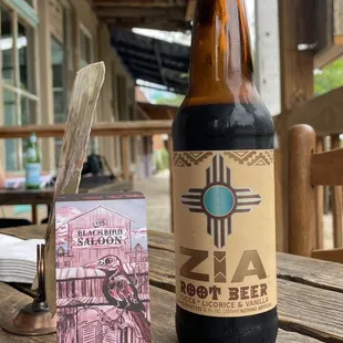 Zia root beer next to their business card