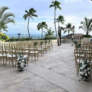 Keani and Sky helped decorate the ceremony from the aisles to the arch