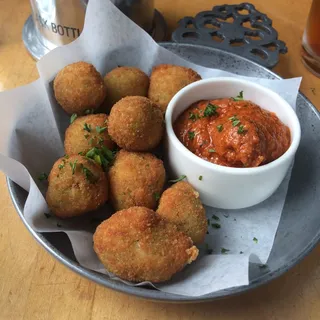 Reggianito stuffed Spanish Fried Olives & Romesco