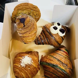 Ube cruffin, pride croissant, passion fruit croissant, sea salt chocolate chip cookie.