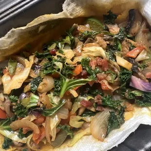 Sautéed cabbage, kale, mushrooms, onions and peppers.