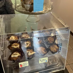 a display of cupcakes and pastries