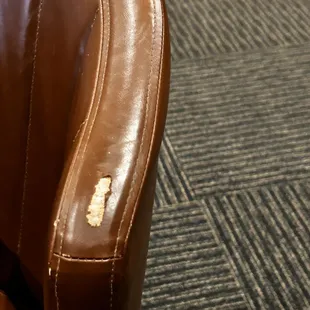a brown leather chair