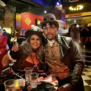 Us inside at a table with a great view of the dance floor