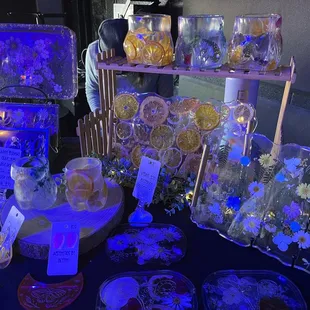 a table with a variety of glass items