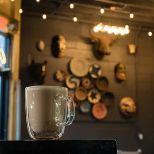 a cup of coffee on a counter