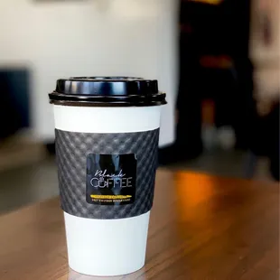 Tall Black Eye with splash of cream.