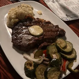 Ribeye, garlic mashed potatoes and veggies