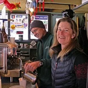 a man and woman in a coffee shop