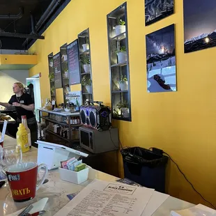 a man preparing food in a restaurant