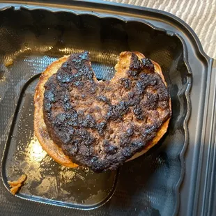 Take out burger. Burnt on both sides!