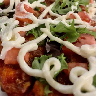 a closeup of a pizza with toppings