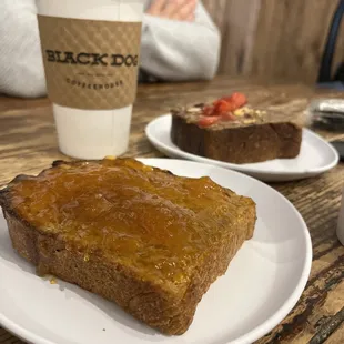 a piece of bread and a cup of coffee