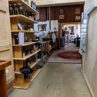 a dog in a room with shelves