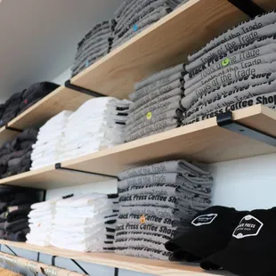  a shelf full of t - shirts