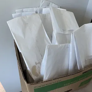 Individually packaged rolls and cornbread for catering