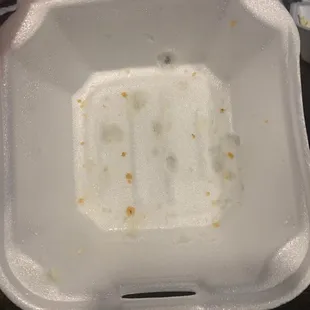Melted styrofoam container from Fried Pickles