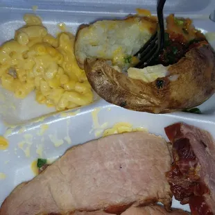 a meal in a styrofoam container