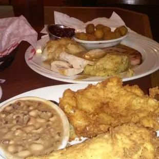 Chicken fried chicken black eye peas fried corn and the turkey dinner glazed ham with mashed potatos fried okra