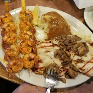 Mushroom swiss chicken with shrimp and mashed potatoes