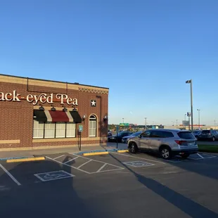 a parking lot with parked cars