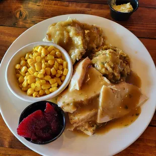 Cracked pepper turkey breast dinner with dressing, mashed potatoes, corn and cranberry sauce $12.99