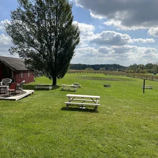 picnic tables and a barn