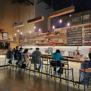 people sitting at the bar