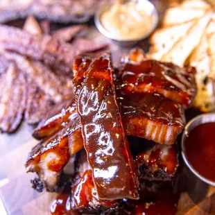 ribs and sides on a cutting board