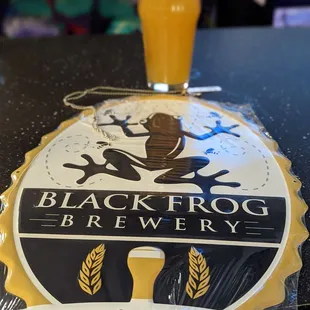 a glass of beer on a table