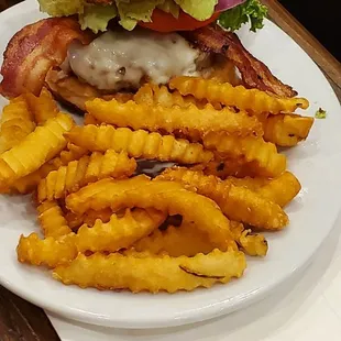 Bacon provalone avocado burger with fries