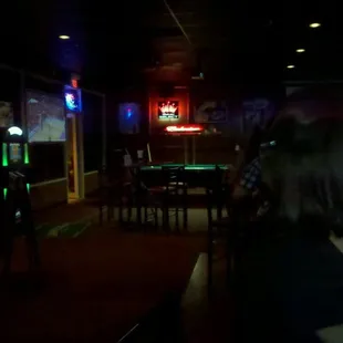 a woman sitting at a bar