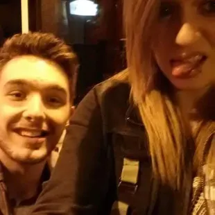 a man and a woman posing for a picture