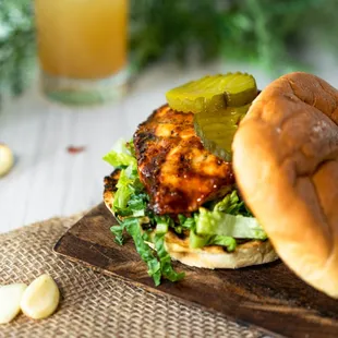 a grilled chicken sandwich with pickles