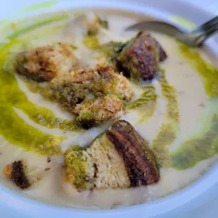Potato leek soup with rye croutons and leak oil