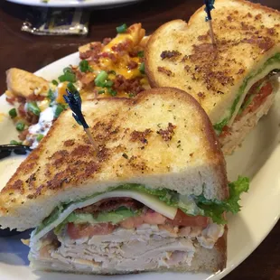 Turkey bacon and avocado sandwich with irish nachos