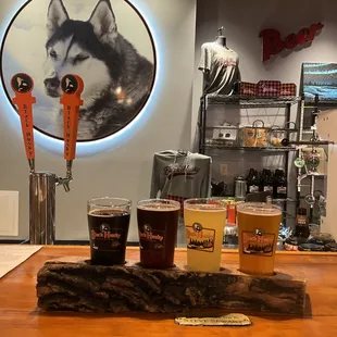 Flight in the taproom.   Nice log/wilderness style flight board.