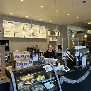 a woman behind the counter