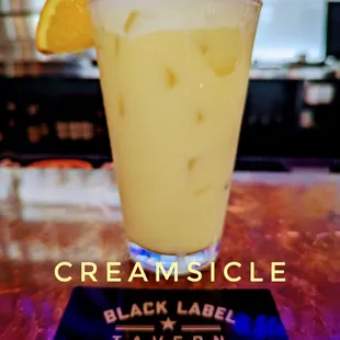 a glass of creamsice