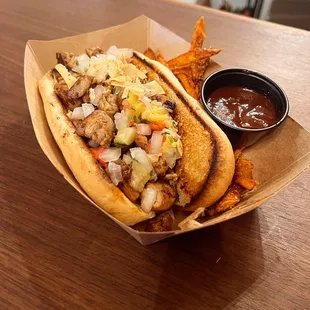 Jamaican jerk chicken and sweet potato fries. I highly recommend.
