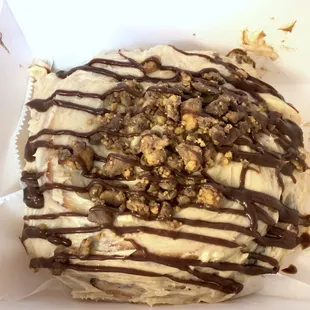 Reese's Bun (chocolate filling, peanut butter cream cheese frosting, Reese's crumbles, ganache)