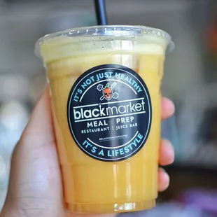 a person holding a drink