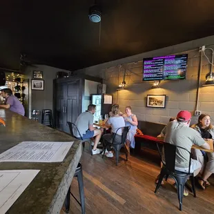 people sitting at the bar