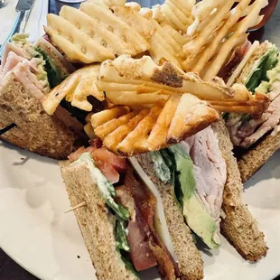 Turkey club with Cris&apos;s cut fries.