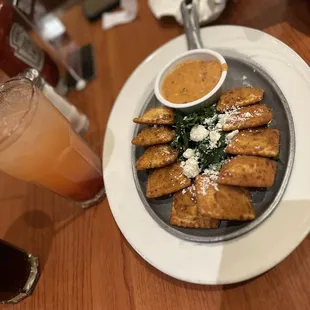 a plate of food and a drink